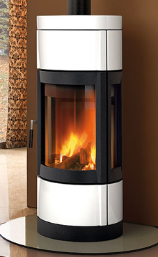 NORDICA-EXTRAFLAME modelo FORTUNA PANORAMA 7 Kw. (blanca infinity o burdeos) Revestimiento externo en mayòlica echo a mano  Base y cuerpo giratorio en el eje Puerta del hogar en hierro colado con vidrio ceramico cada lado  Hogar en Ironker